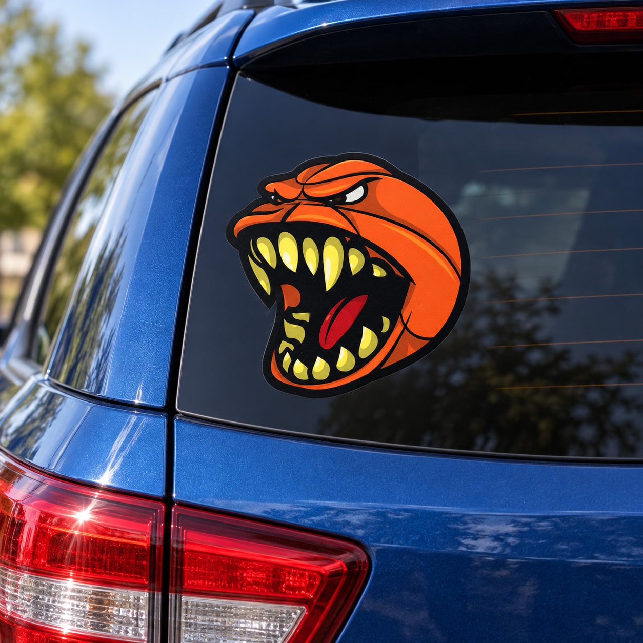 Orange screaming basketball mascot vinyl car sticker decal on dark car window