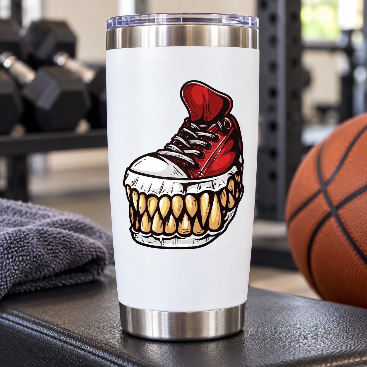 White tumbler with red monster basketball shoe and tooth grin graphic