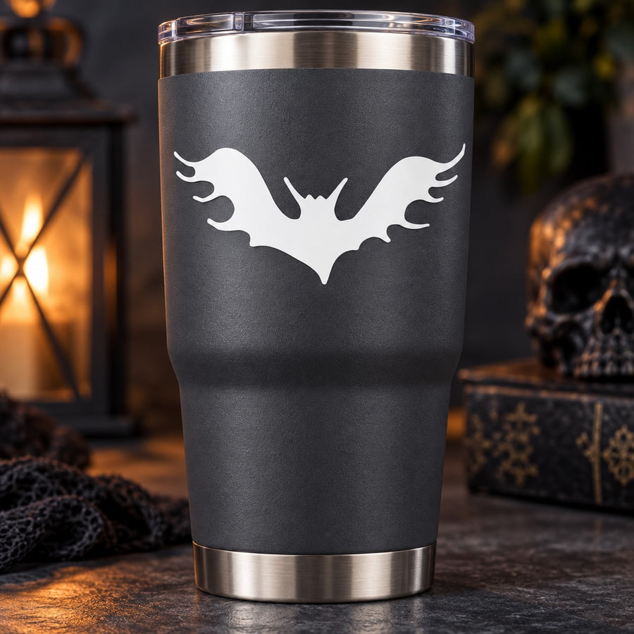 Black tumbler with white bat decal silhouette