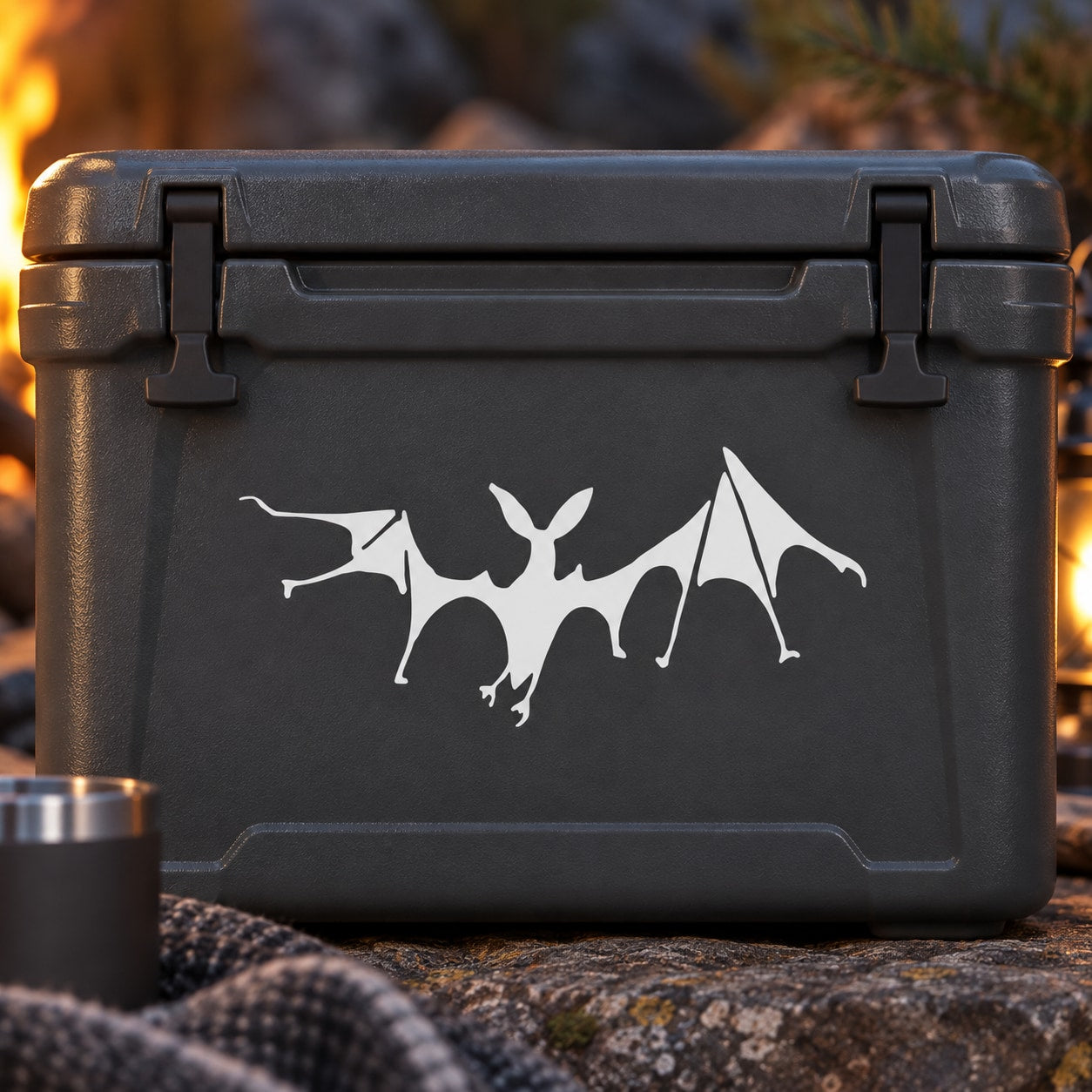 White mangled bat decal on black rectangular case lid