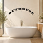 Arched OUTHOUSE wall decal, black letters above bathroom sink