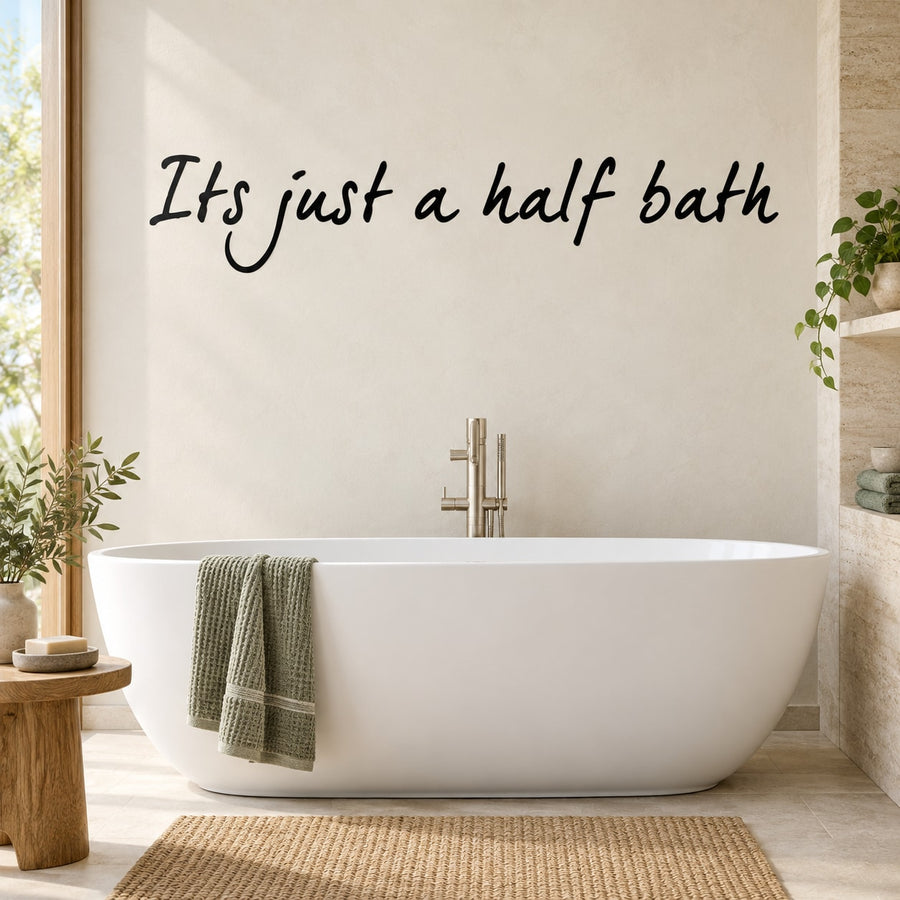 Half bath wall decal: cursive “It’s just a half bath” text.