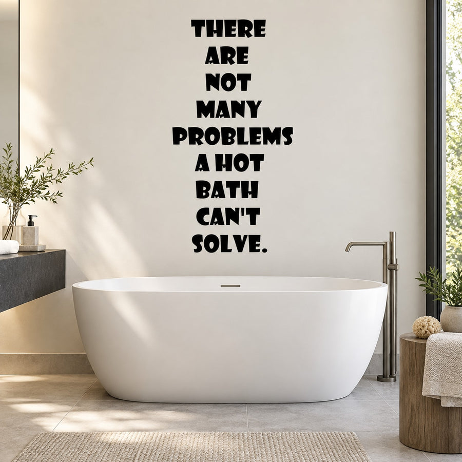 Black wall decal with stacked quote: “There are not many problems a hot bath can’t solve.”