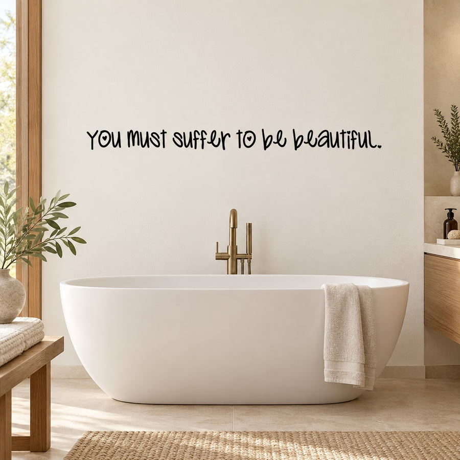 Wall decal with quote text: “You must suffer to be beautiful.”