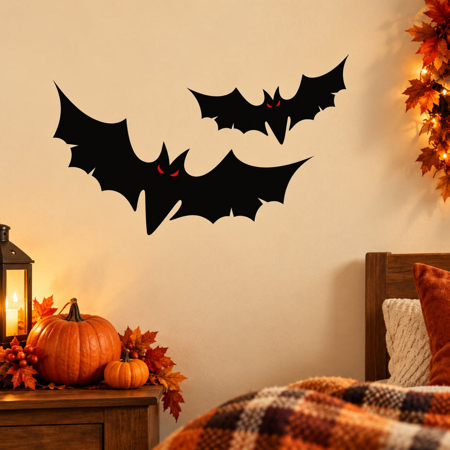 Black bat wall decal with three bats and red eyes