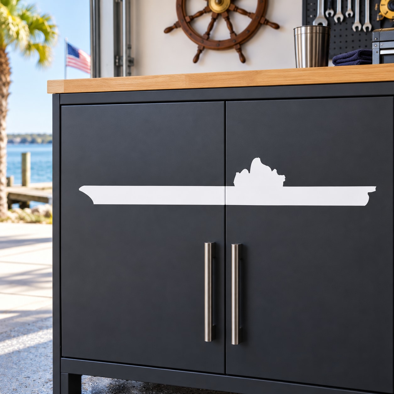 Aircraft carrier silhouette decal in white on dark cabinet doors