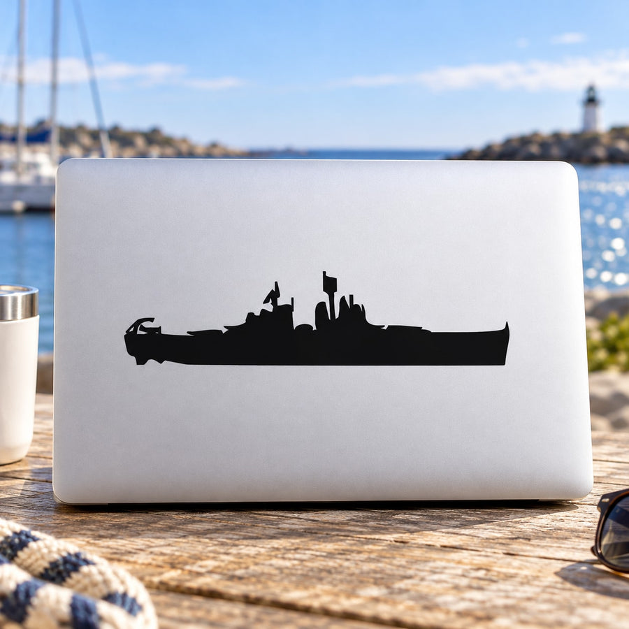 White laptop decal with black destroyer ship and crane silhouette