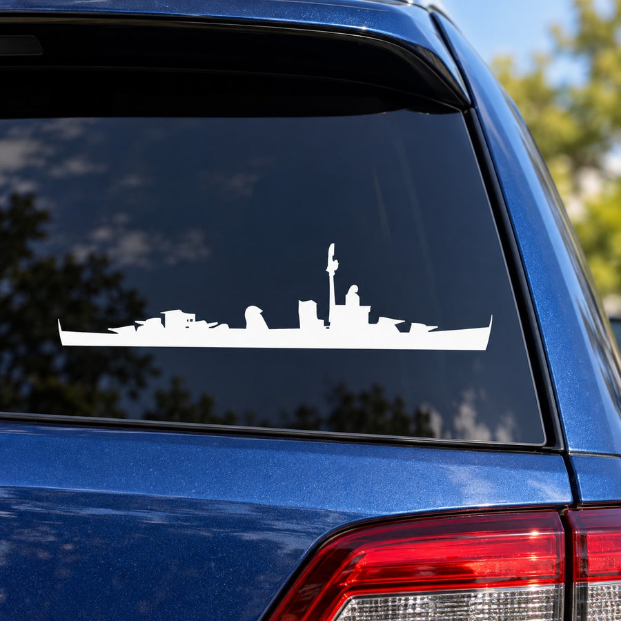 White destroyer ship decal silhouette on dark vehicle window