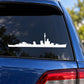 White destroyer ship decal silhouette on dark vehicle window