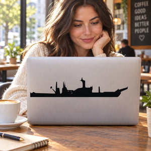 Black battleship silhouette decal on a laptop lid