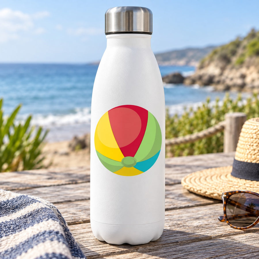 Colorful beach ball sticker with red, yellow, green panels on white surface