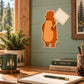 Bear with sign sticker, orange cartoon bear holding a blank sign