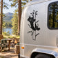 Black bear silhouette peeking from a tree branch decal