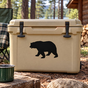 Black bear silhouette decal on light tan cooler lid