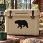 Black bear silhouette decal on light tan cooler lid