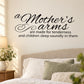 Wall decal: cursive "Mother's Arms" quote about tenderness and children sleeping.
