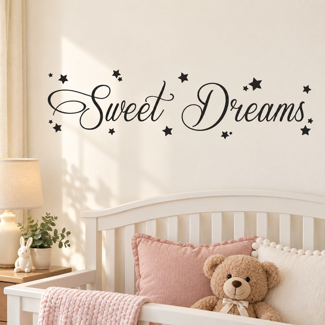 Sweet Dreams wall decal with cursive lettering and small star accents