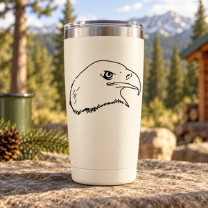 Eagle head outline vinyl decal in black on a white tumbler