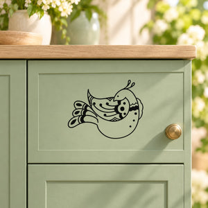 Peacock fluttering decal, black outlined bird with curled tail feathers