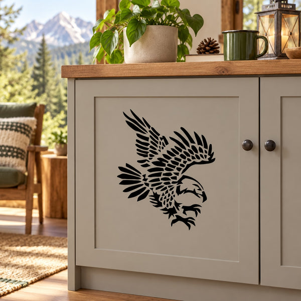 Feathered reaching eagle vinyl decal, black silhouette on white backing