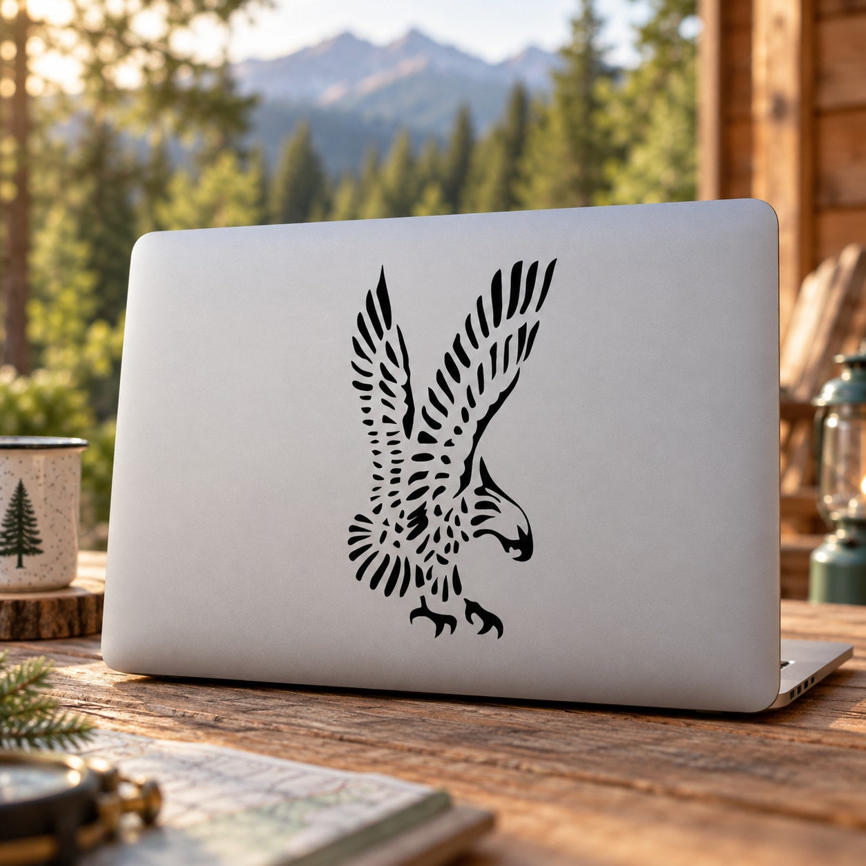 Frayed Eagle decal: black eagle with outstretched wings centered on a laptop lid
