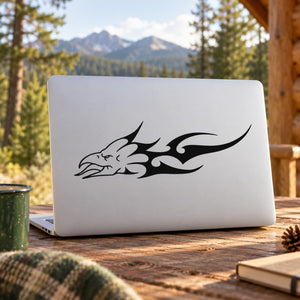 Tongue-out fire eagle head decal on white laptop lid, black outline