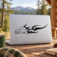 Tongue-out fire eagle head decal on white laptop lid, black outline