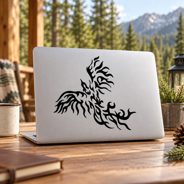 Black flame eagle decal graphic on a laptop lid