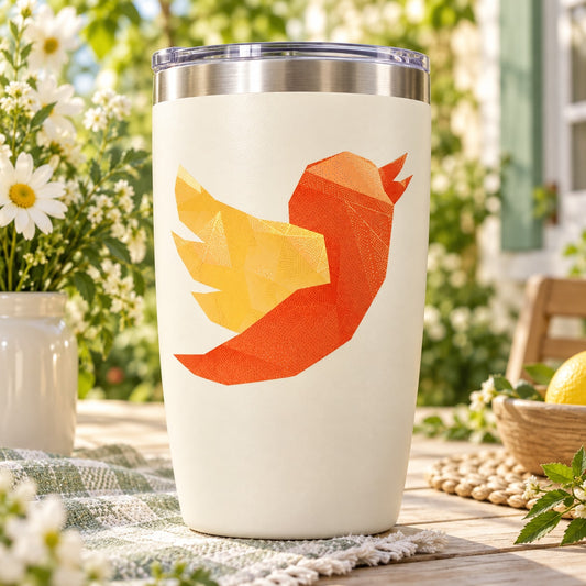 Geometric flying bird decal on white insulated tumbler with silver lid