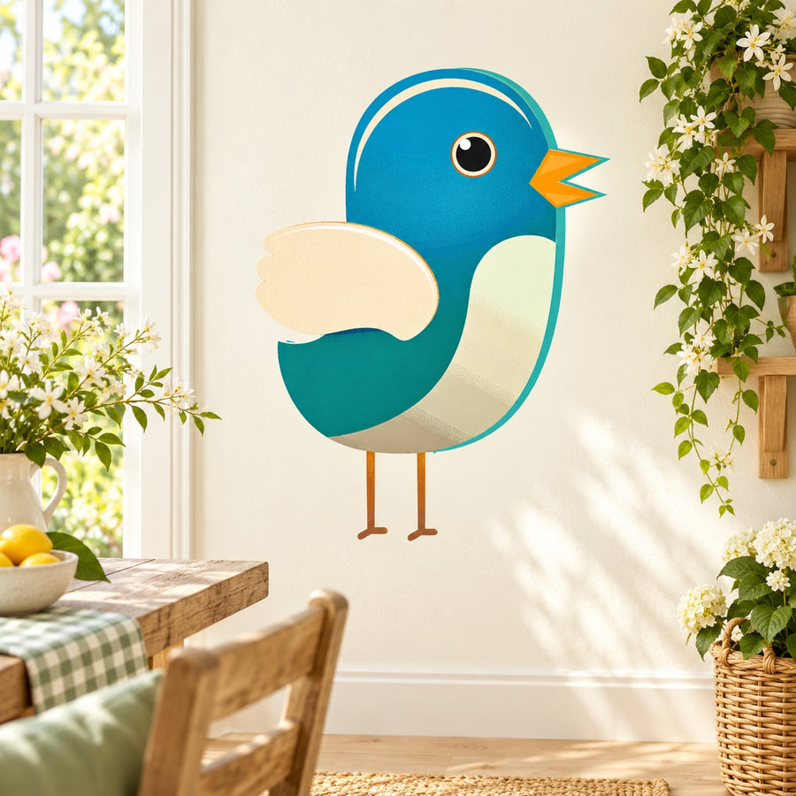 Bird sticker with blue body, cream belly, and orange beak