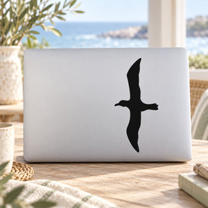 Albatross flying decal sticker with black bird silhouette on a light surface