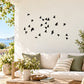 Bird flock wall decal with multiple black flying silhouettes
