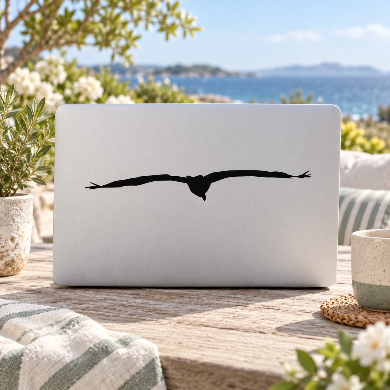 Black seagull in-flight vinyl decal with wings spread silhouette