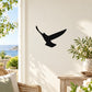 Black falcon silhouette wall decal with bird-in-flight shape