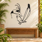 Upset toucan wall decal in black and white, arched beak and feathered wings