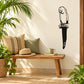 Black parrot line-art wall decal with head tilted forward