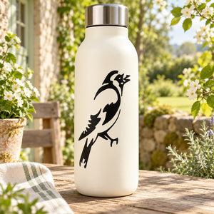 Goldfinch bird decal showing a black outline on a white bottle
