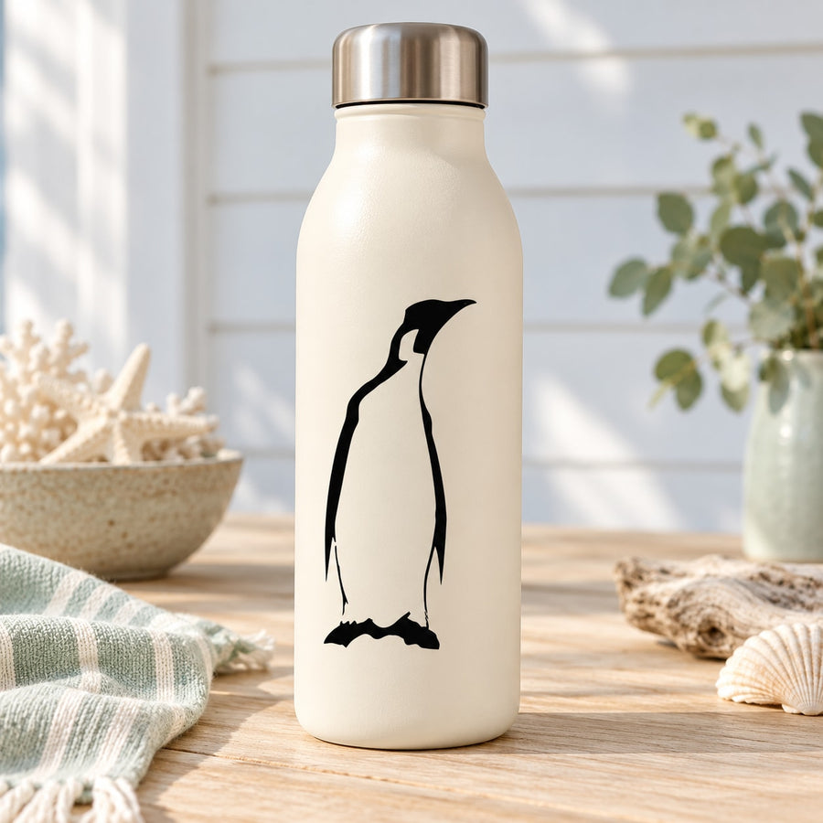 White water bottle with black penguin decal looking off