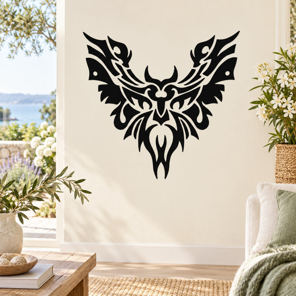 Black stylized bird decal with tribal flame-like wings and central emblem