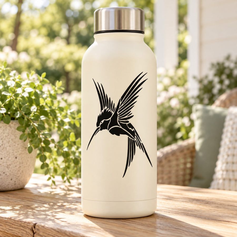 White water bottle with black hummingbird decal