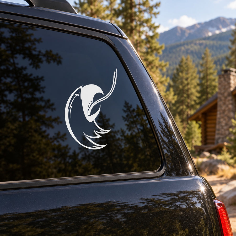 White eagle head decal with long tongue on car window