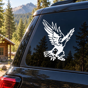 White flying eagle decal on dark car rear window