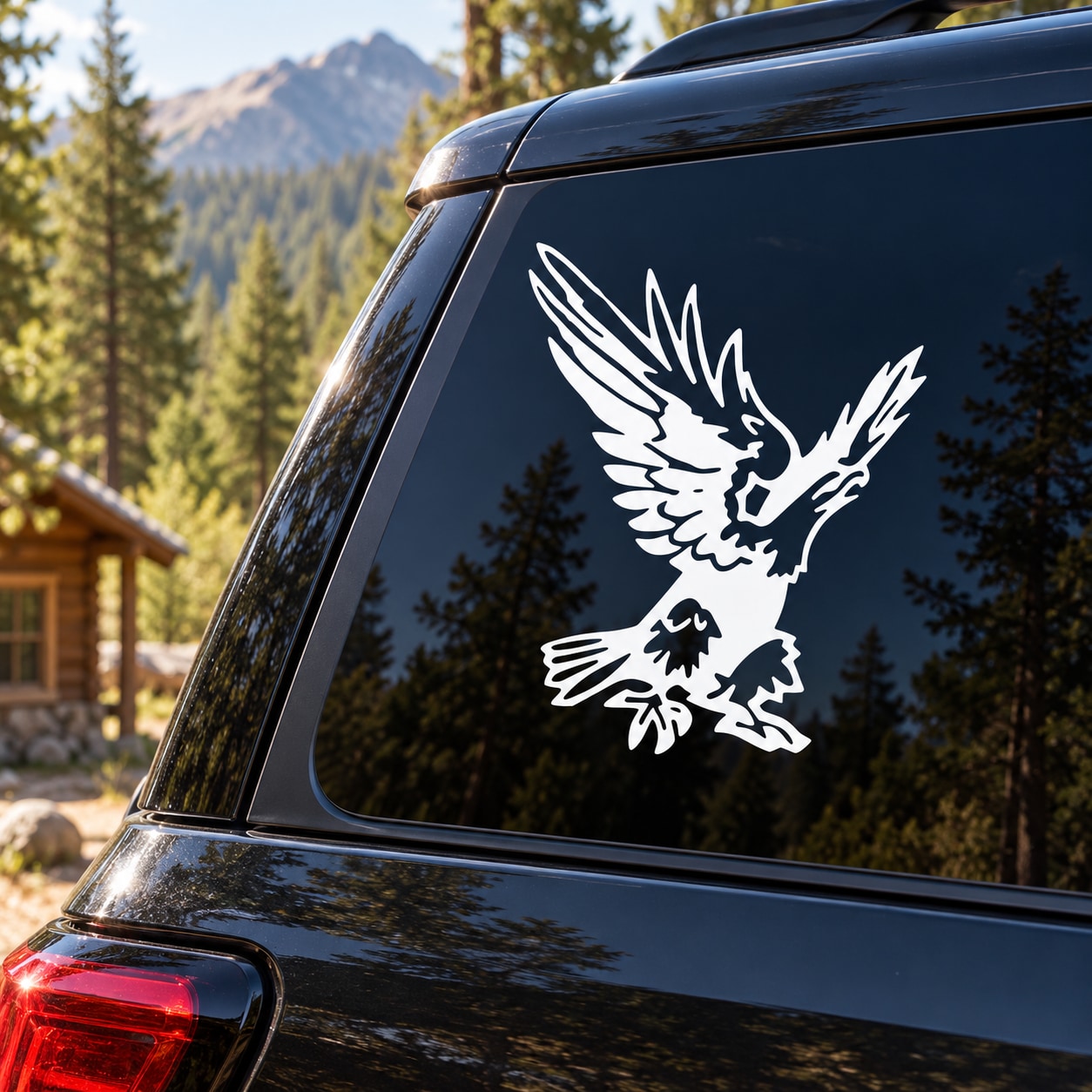 White flying eagle decal on dark car rear window