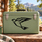 Hawk decal with sharp wing silhouette, black on dark green surface