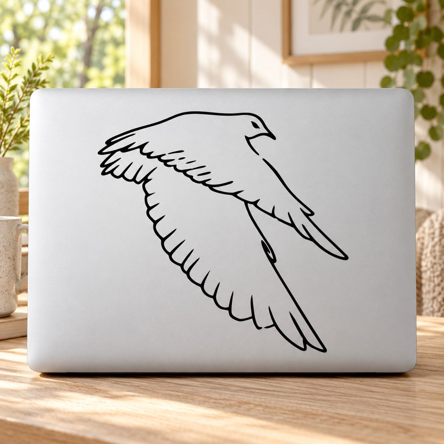 Flying falcon decal with black outline, shown on a light surface