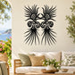 Aztec-style black bird face wall decal with ornate feathered wings