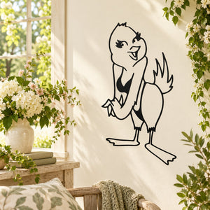 Playful chick bird wall decal with black outline of smiling bird holding bow