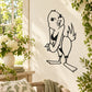 Playful chick bird wall decal with black outline of smiling bird holding bow