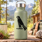 Standing hawk decal: black standing bird graphic on light green bottle