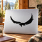 Flying Hawk decal with black hawk silhouette on white laptop lid